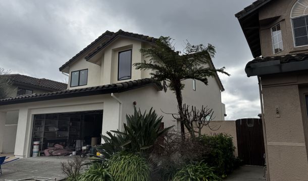 Man conducting drywall repair